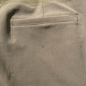 Athleta Endless Olive green pant Small pen mark on back pocket. Size 6